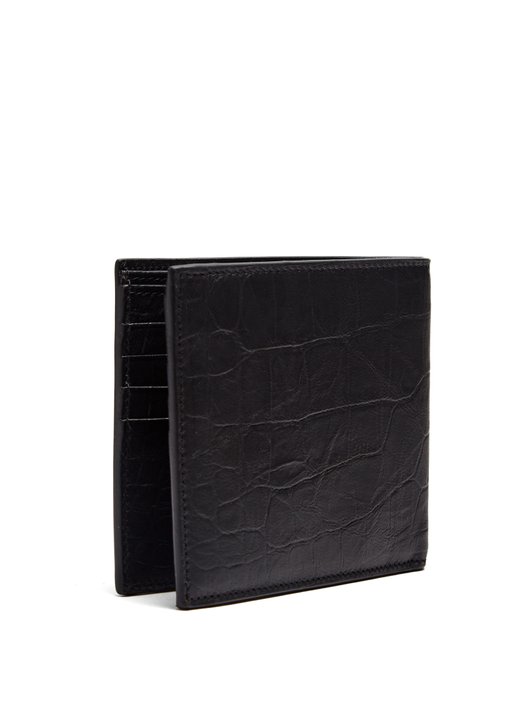 Saint Laurent Monogram crocodile-effect bi-fold leather wallet