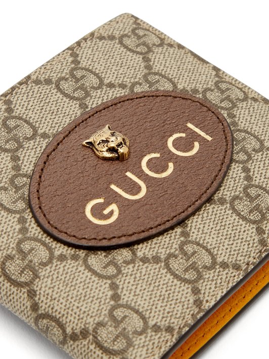 Gucci GG Supreme bi-fold wallet