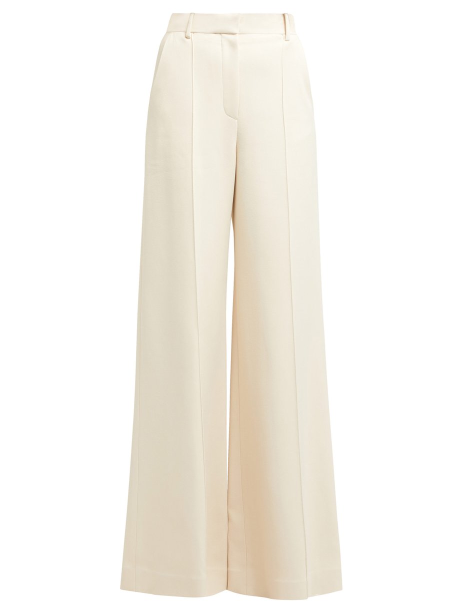 Neutral Isla pintucked flared trousers | The Row | MATCHESFASHION UK