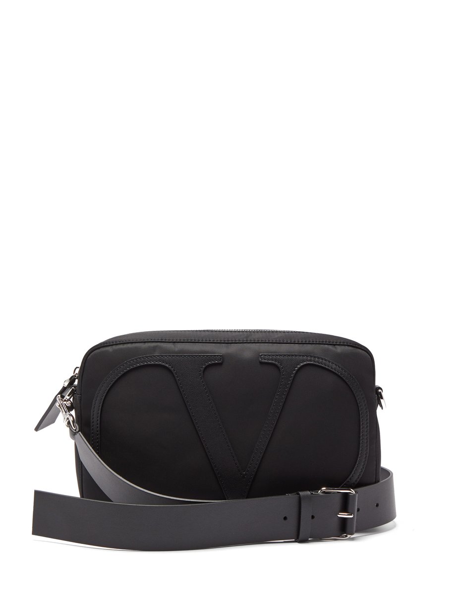 Black V-logo leather-trim cross-body bag | Valentino | MATCHESFASHION US
