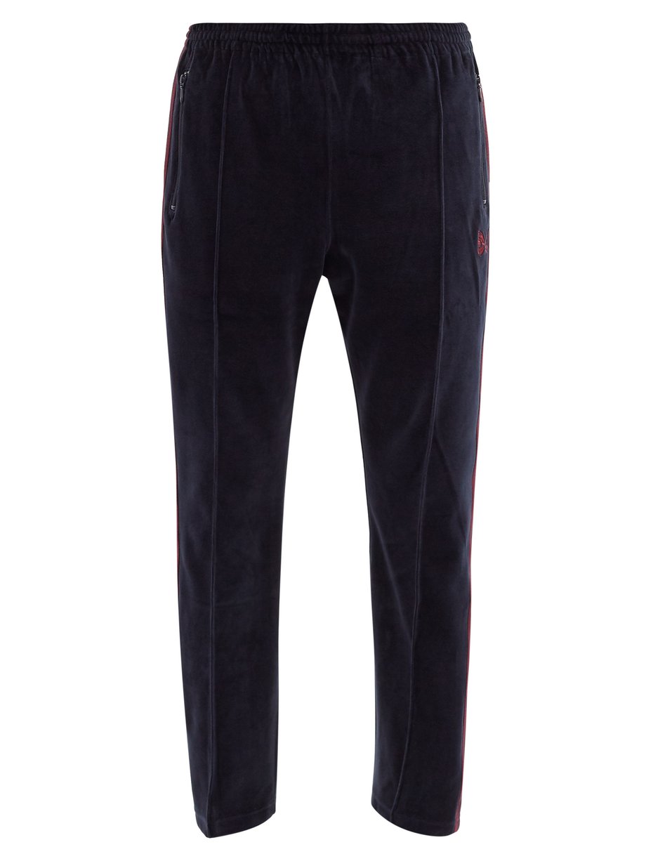 Navy Butterfly-embroidered cotton-blend track pants | Needles ...