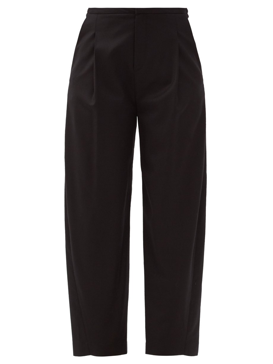Black Pleated wool-blend flannel trousers | Totême | MATCHESFASHION UK