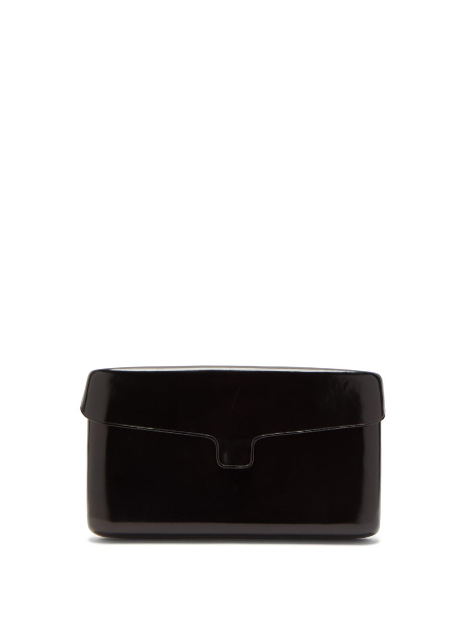 Lemaire Black Cartridge medium leather clutch | 매치스패션, 모던 럭셔리 온라인 쇼핑