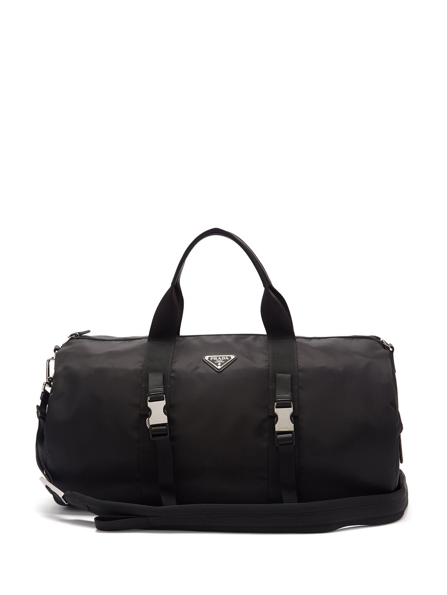 Black Triangle logo-plaque nylon duffel bag | Prada | MATCHESFASHION US