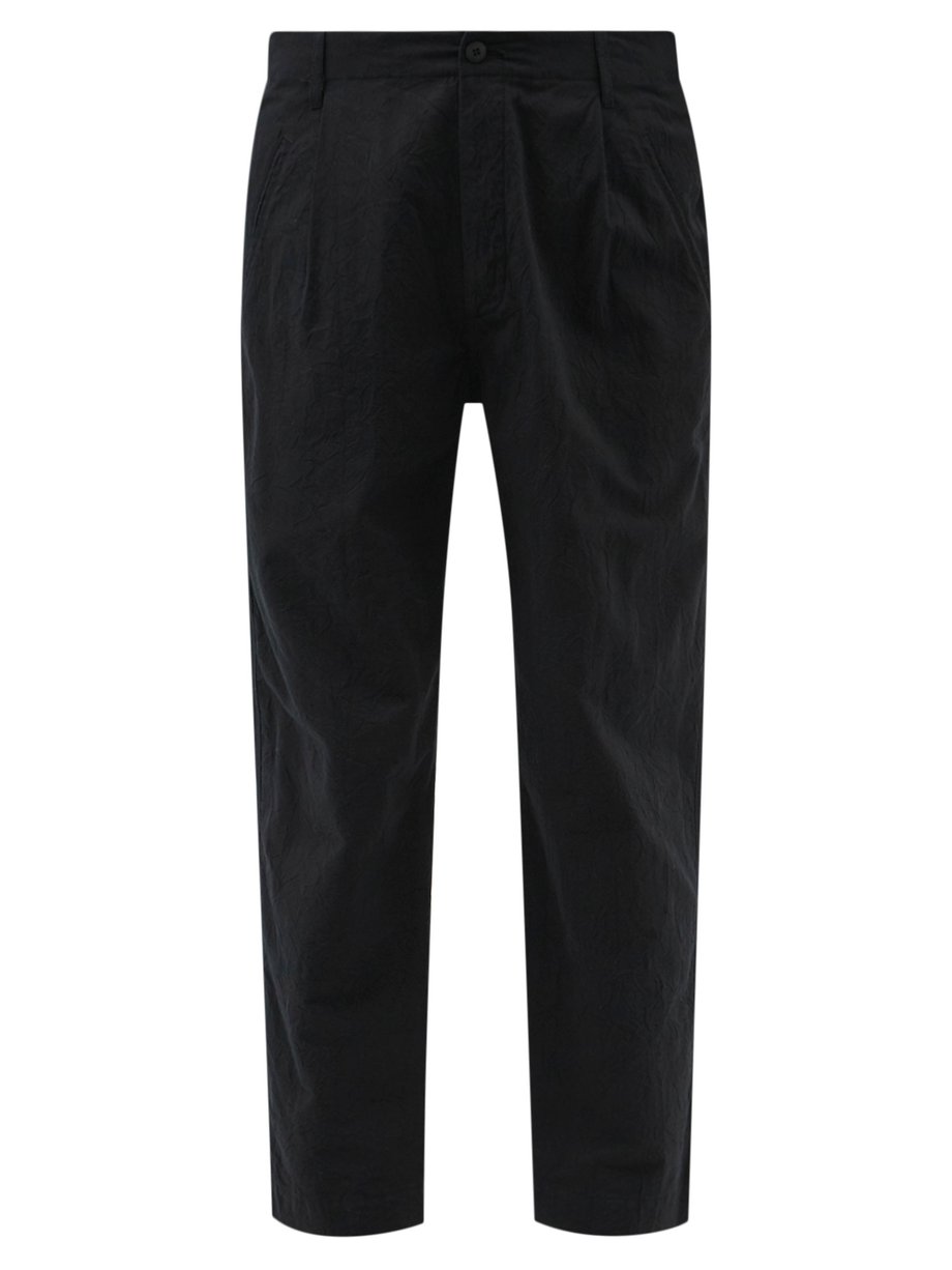 Black Assembly pleated cotton tapered-leg trousers | Folk ...
