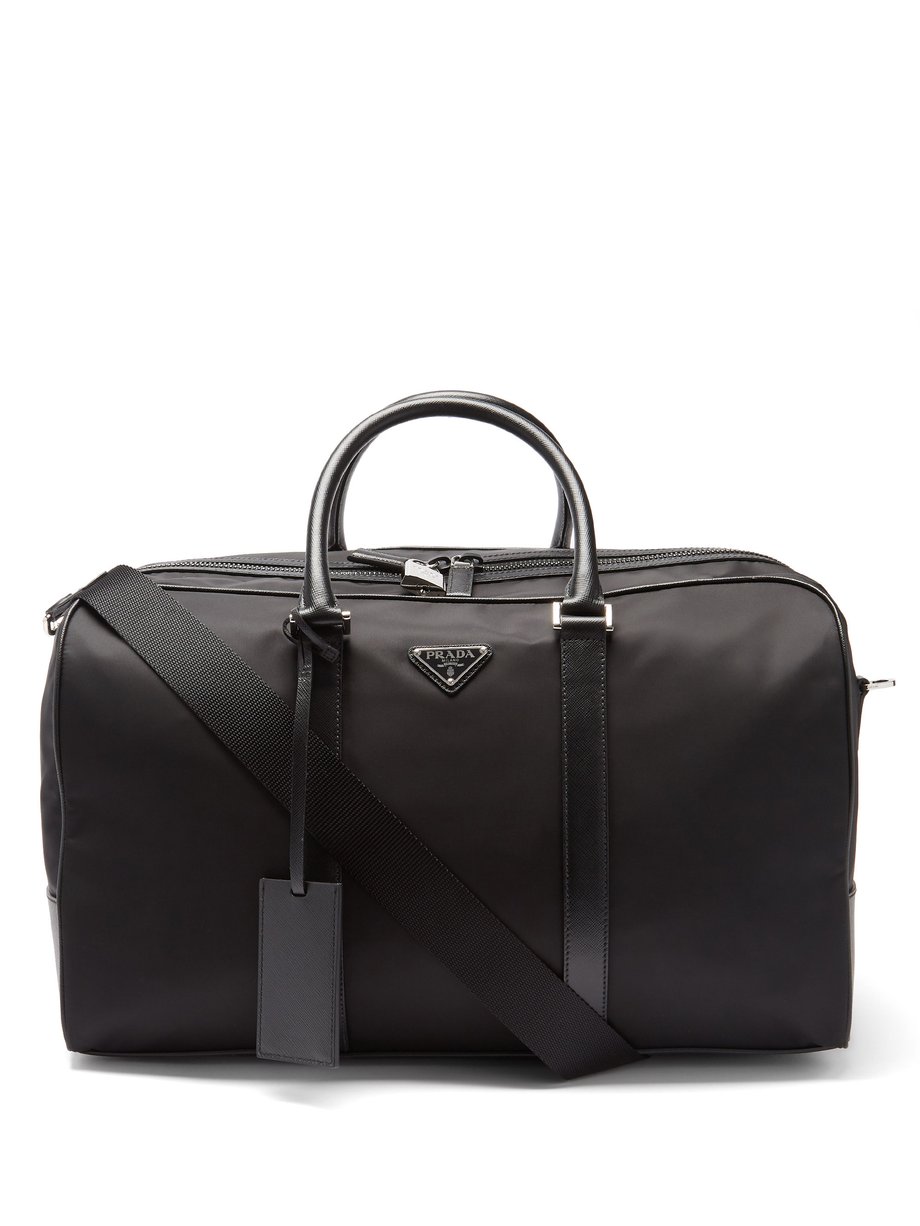 Black Re-Nylon and leather duffel bag | Prada | MATCHESFASHION UK