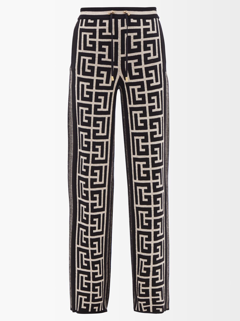 Black Monogram-jacquard merino-blend knitted trousers | Balmain ...