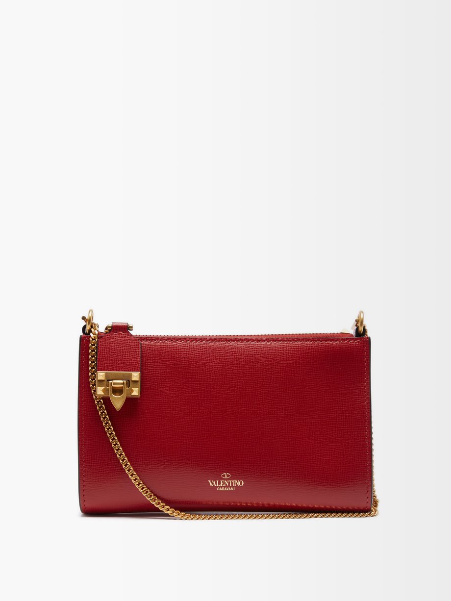 Red Alcove Rockstud-embellished leather cross-body bag Valentino | MATCHESFASHION AU