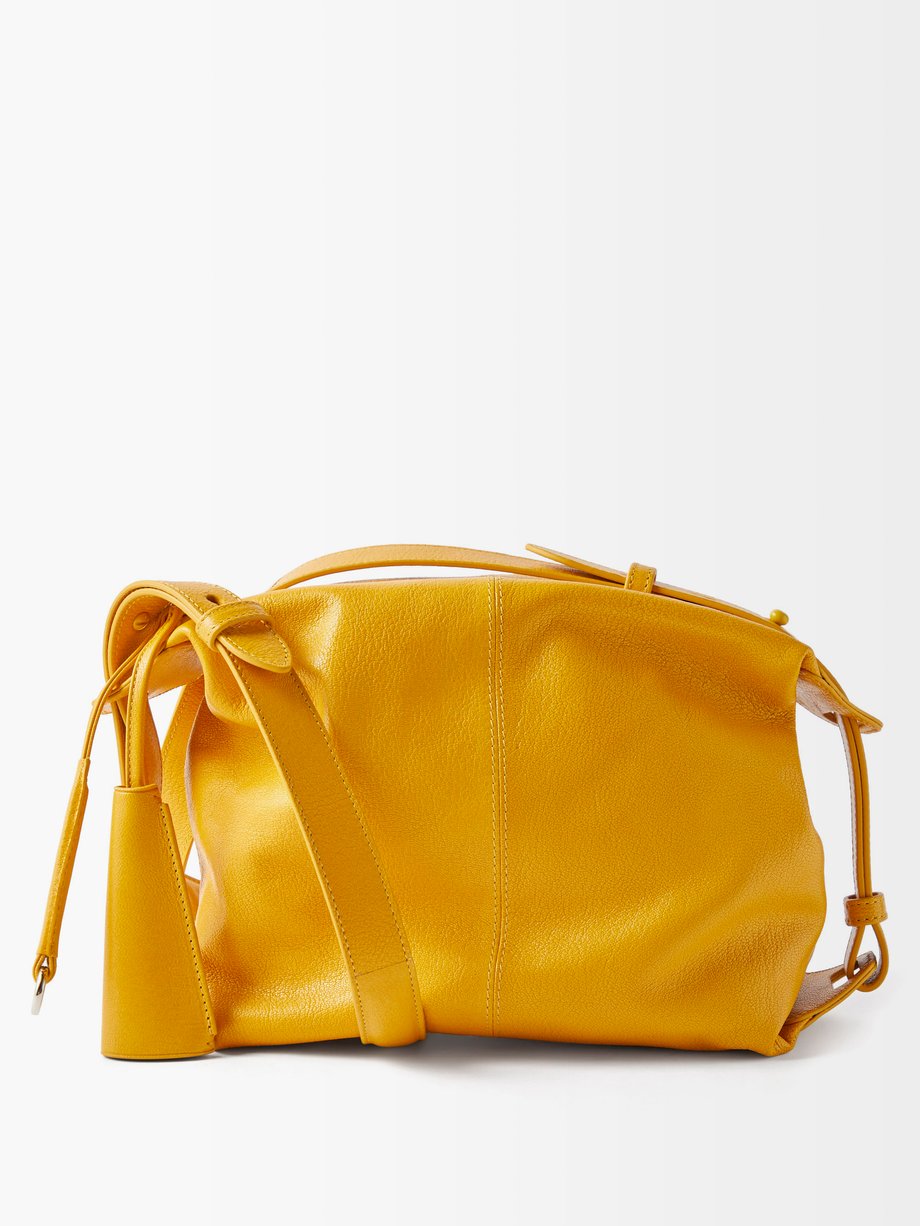 Lemaire Yellow Folded leather shoulder bag | 매치스패션, 모던 럭셔리 온라인 쇼핑
