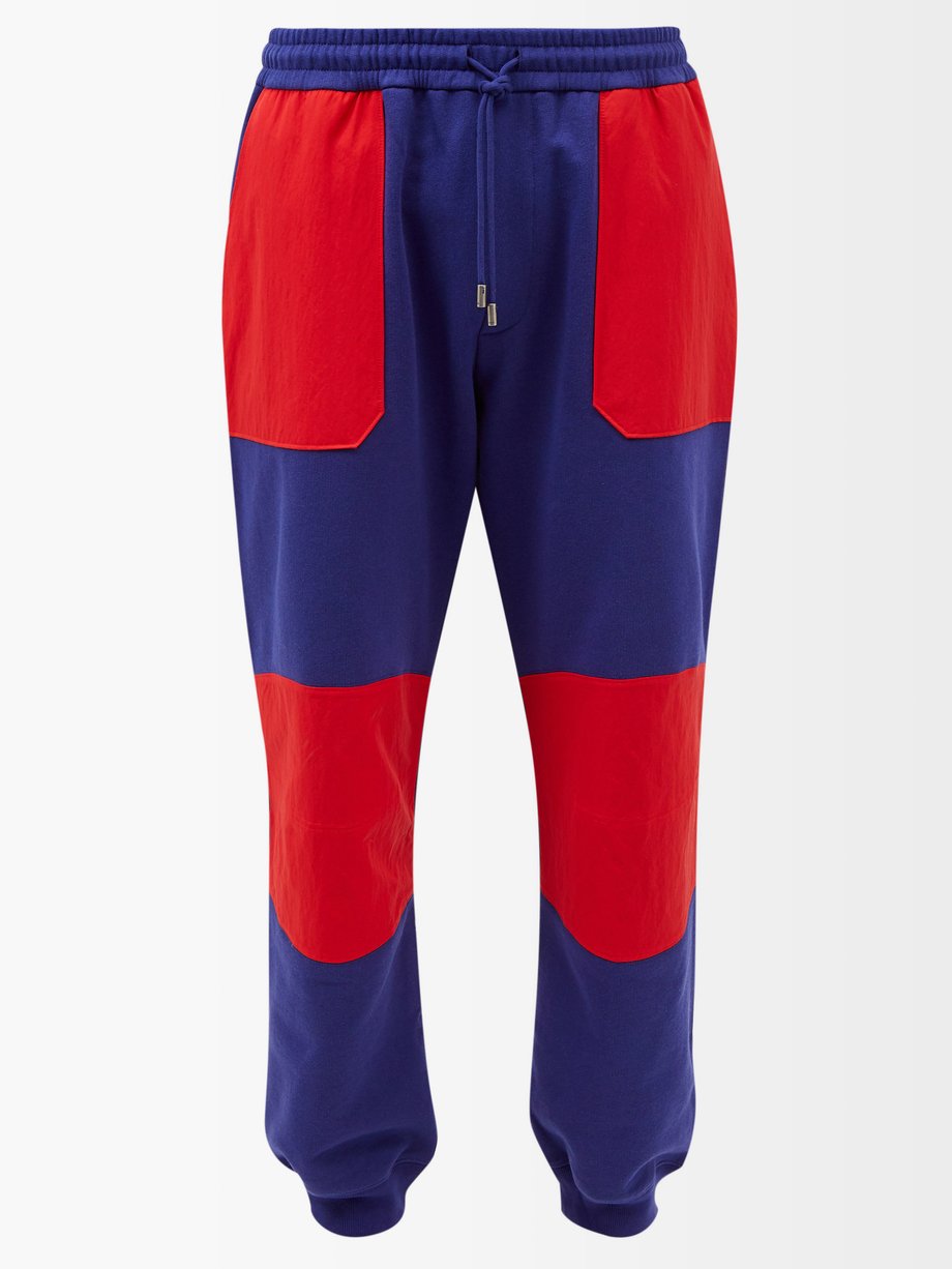 Gucci Blue X The North Face colour-block track pants | 매치스패션, 모던 럭셔리 온라인 쇼핑