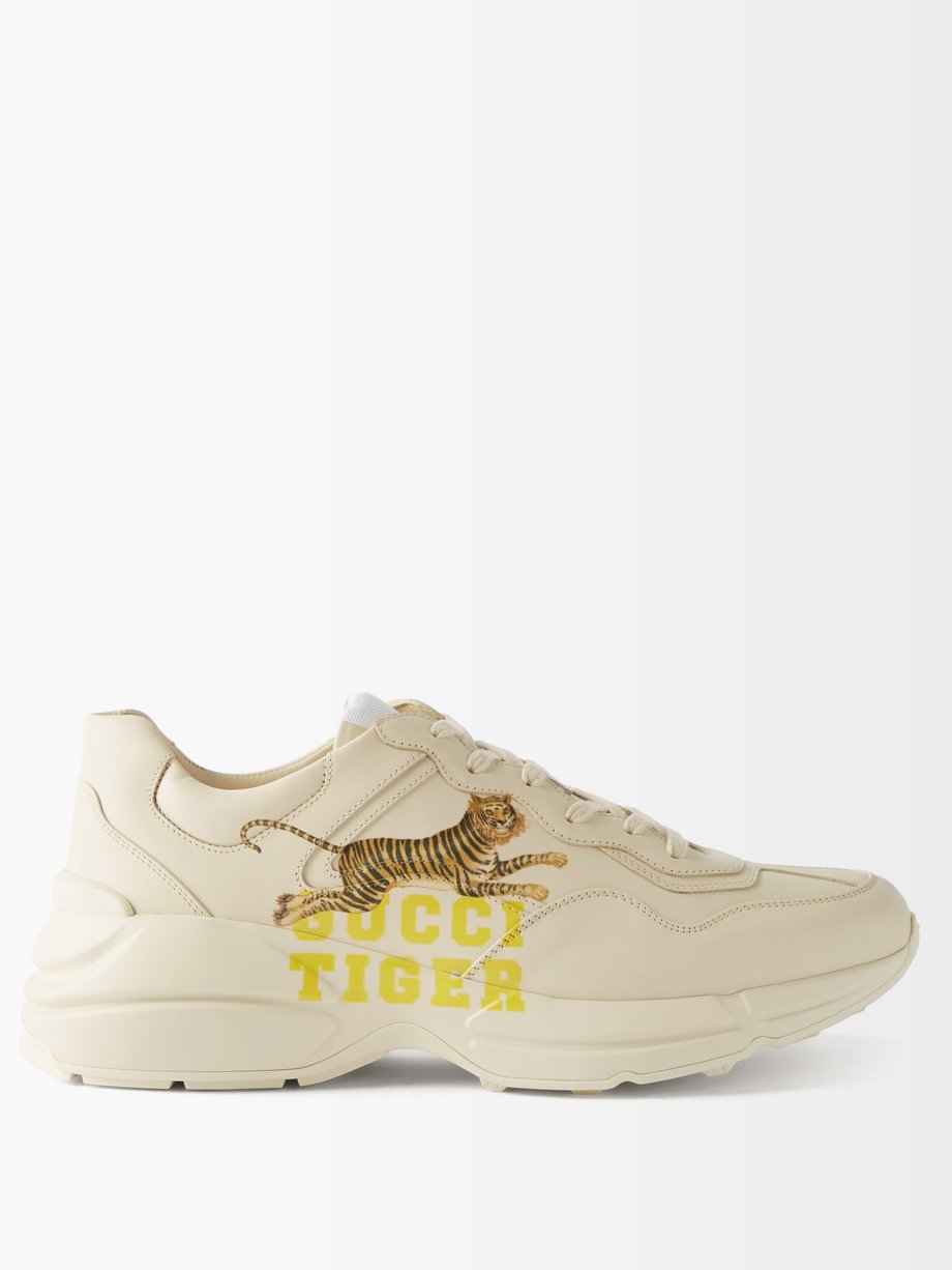 gold gucci trainers