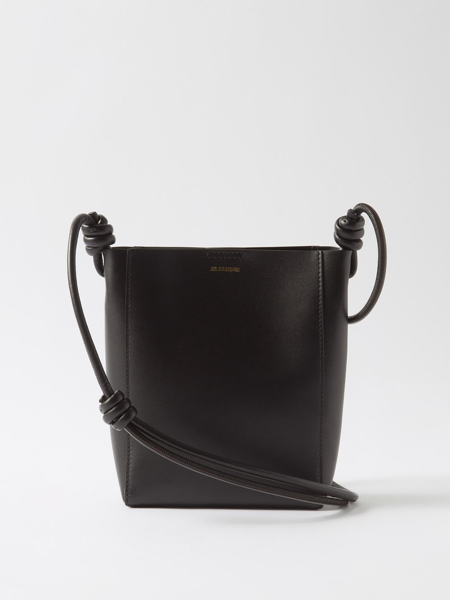 Jil Sander Black Knotted-strap mini leather tote bag | 매치스패션, 모던 럭셔리 온라인 쇼핑