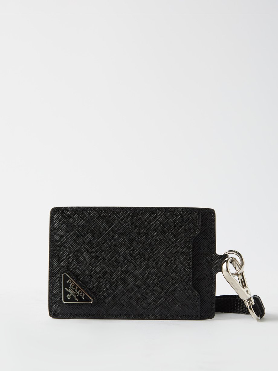 Femme Accessoires Portefeuilles et porte-cartes Porte-monnaie à plaque logo Cuir Prada en coloris Noir 