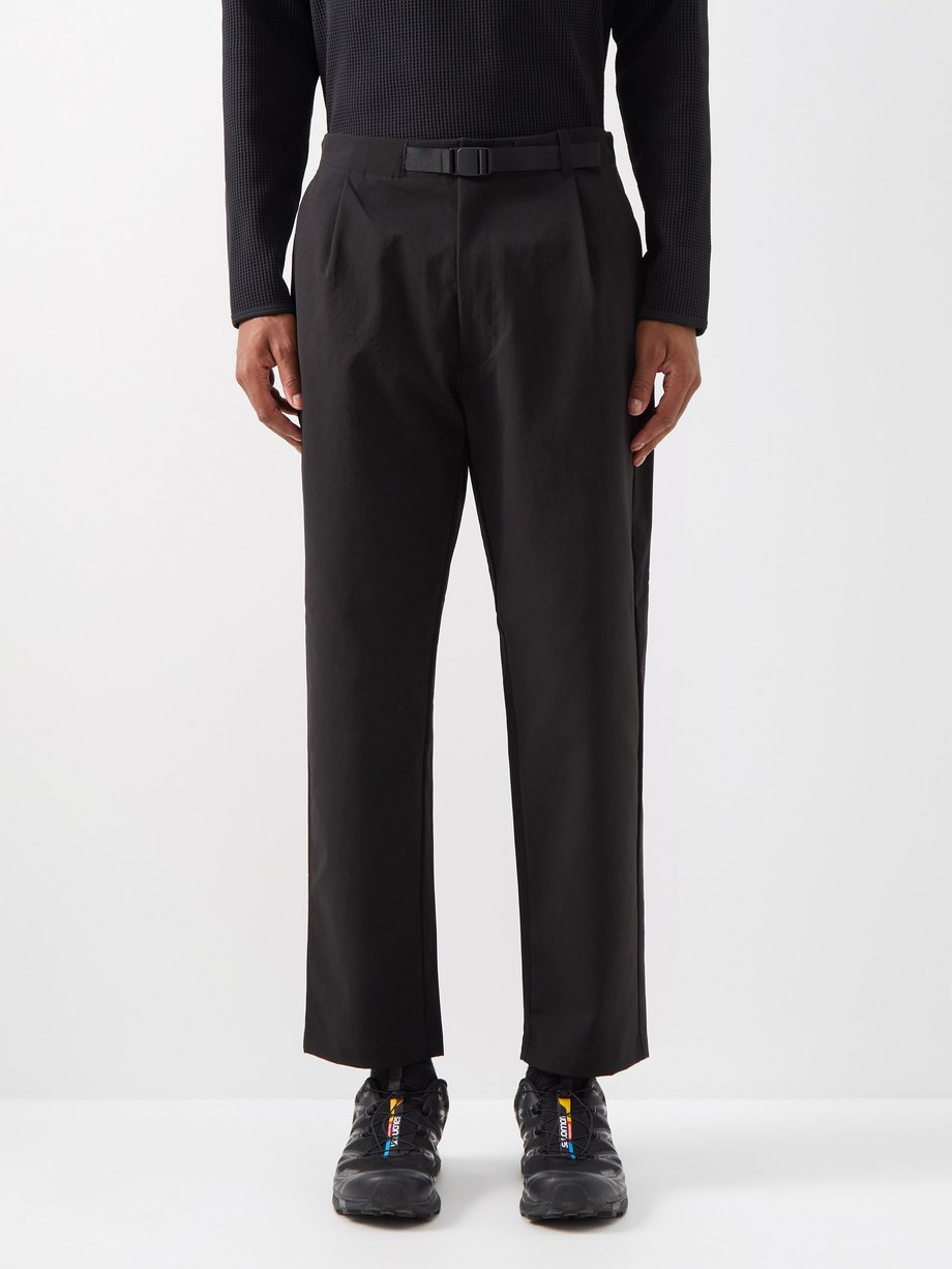 GOLDWIN GOLDWIN One Truck stretch-shell trousers Black｜MATCHESFASHION ...