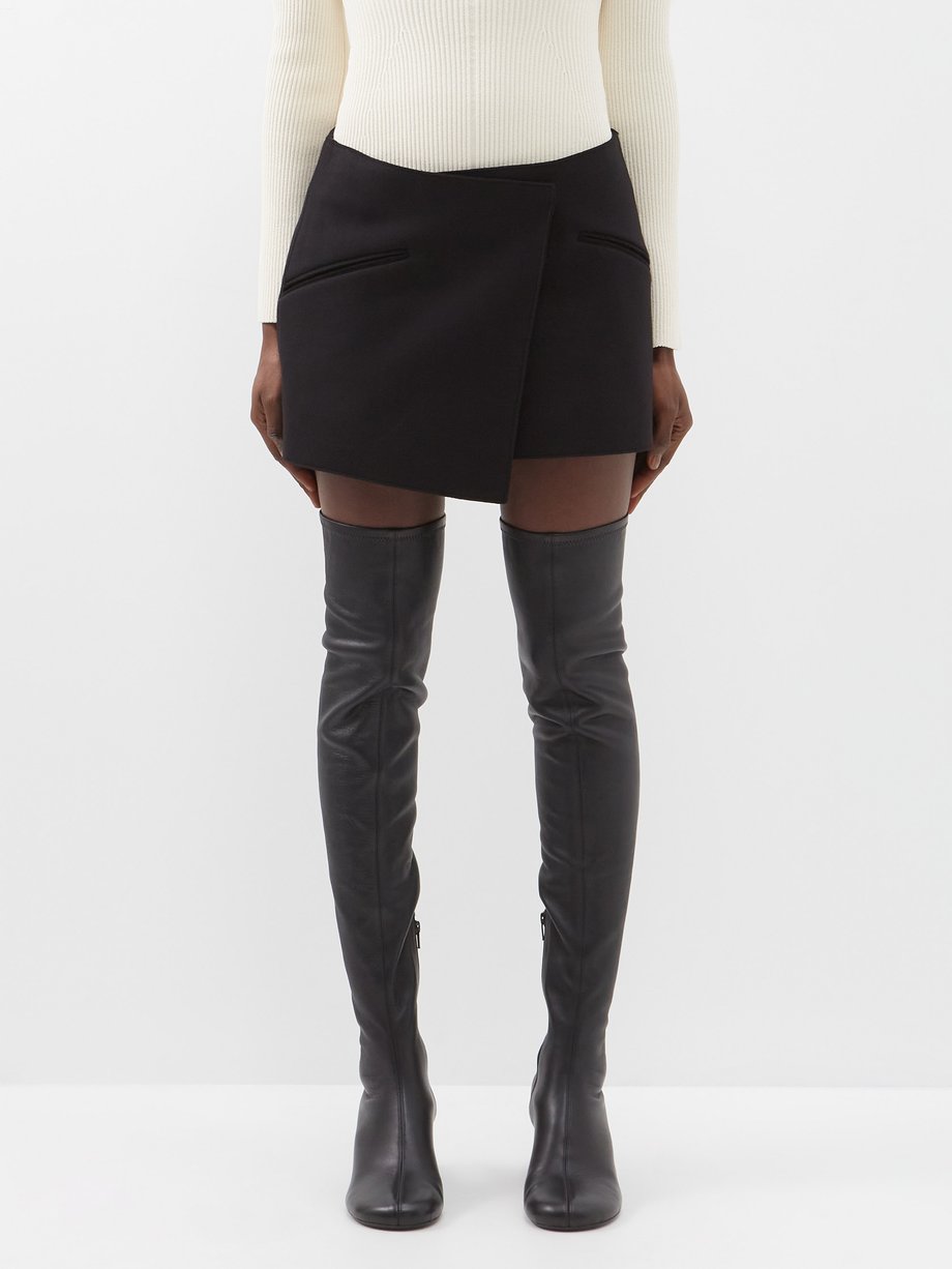 Khaite Black Vera asymmetric wool-blend mini skirt | 매치스패션, 모던 럭셔리 온라인 쇼핑
