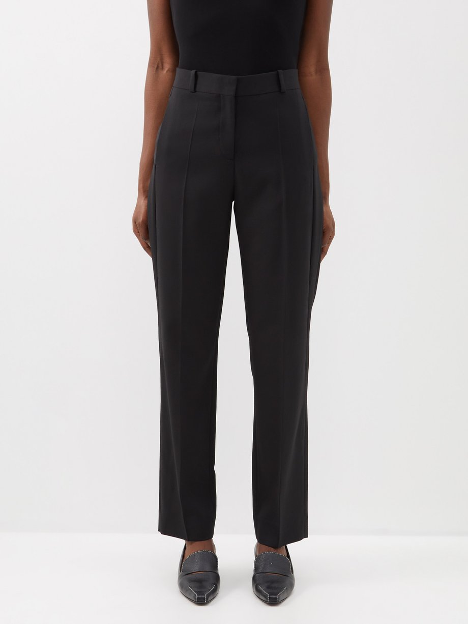 Black Mid-rise slim-leg recycled-fibre blend trousers | Toteme ...