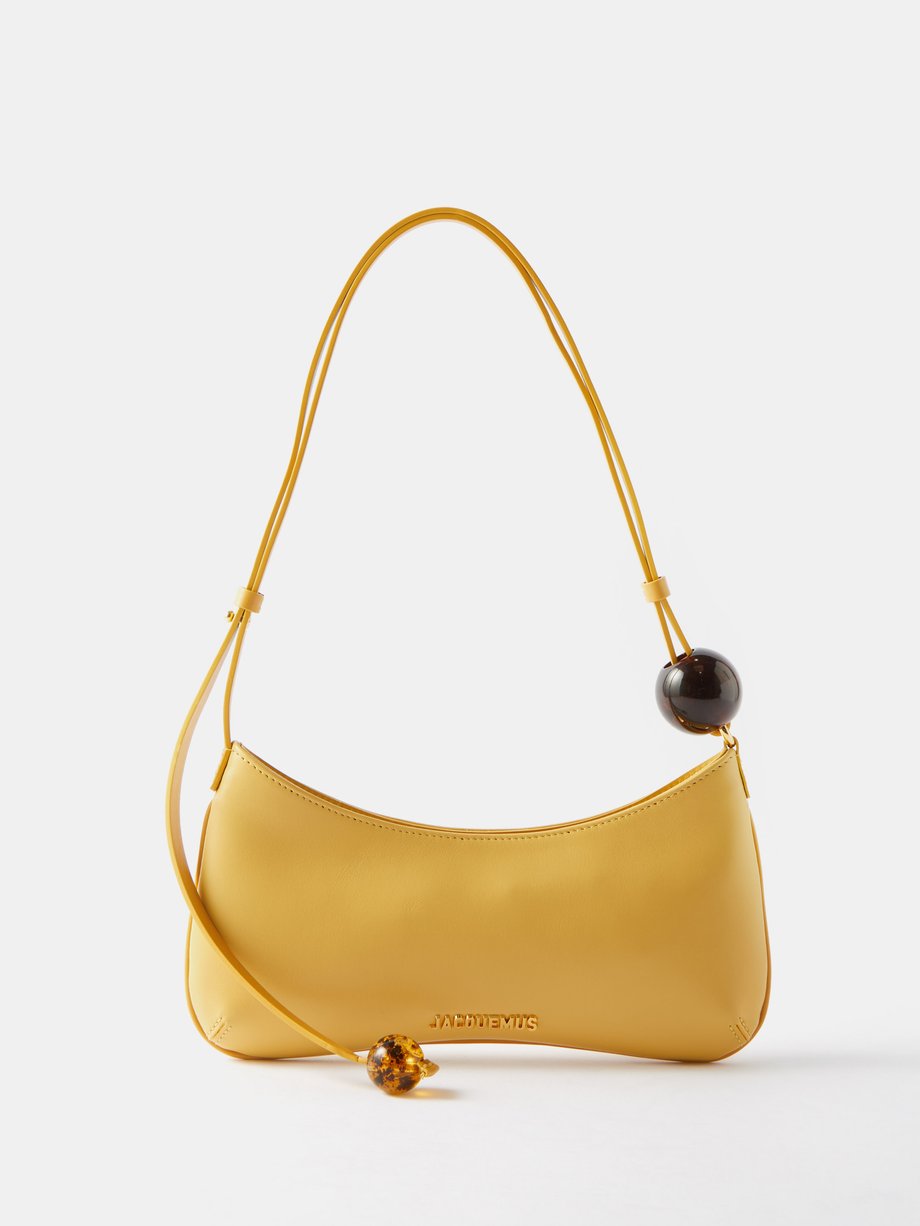 Jacquemus Yellow Bisou Pearl leather shoulder bag | 매치스패션, 모던 럭셔리 온라인 쇼핑