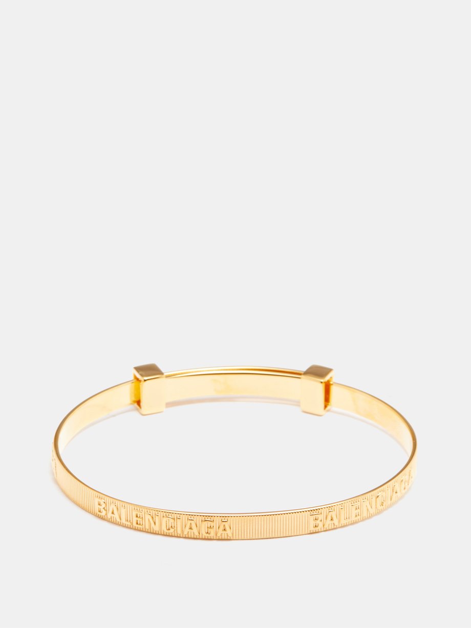 Gold Force logo ribbed metal bracelet | Balenciaga | MATCHESFASHION UK