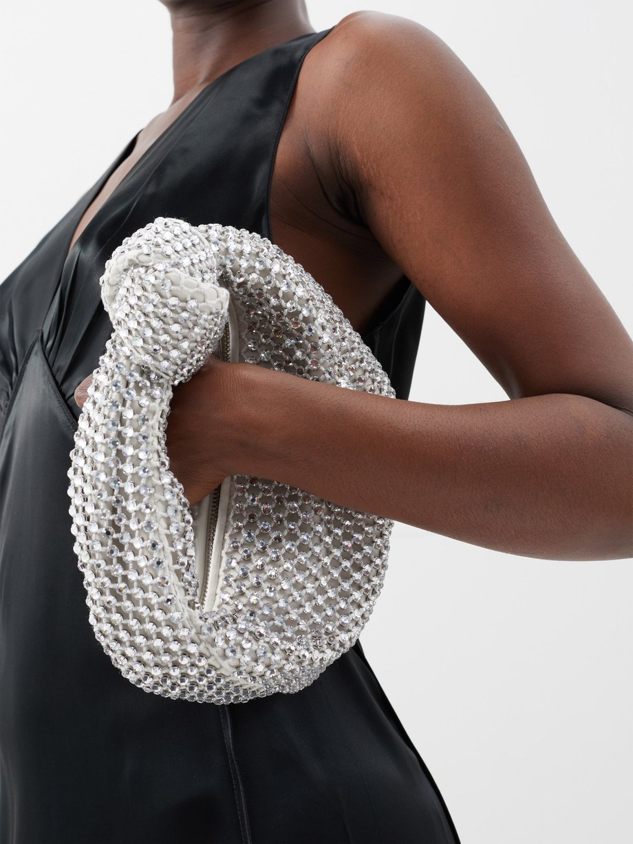 Bottega Veneta Silver Jodie crystal-netting clutch bag | 매치스패션, 모던 럭셔리 ...