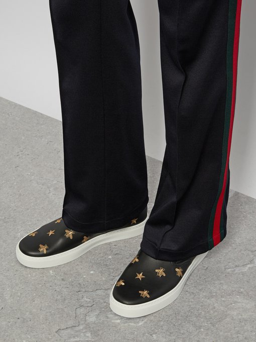 Bee and star-embroidered slip-on leather trainers | Gucci ...