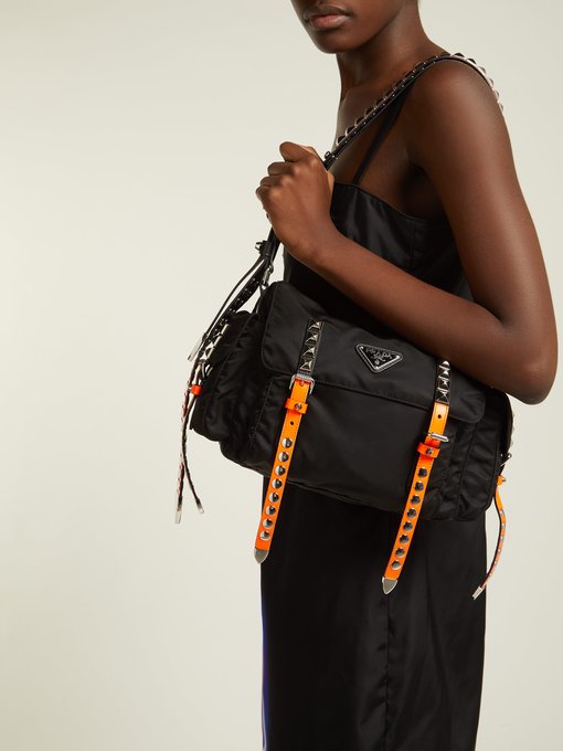 Shop Prada New Vela Studded Nylon Shoulder Bag In Black Orange