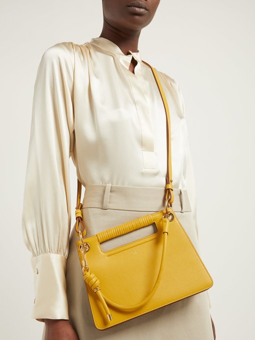 The Whip small cut-out leather cross-body bag | Givenchy ...