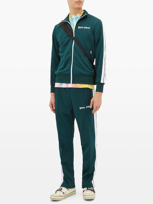 green track pants outfit